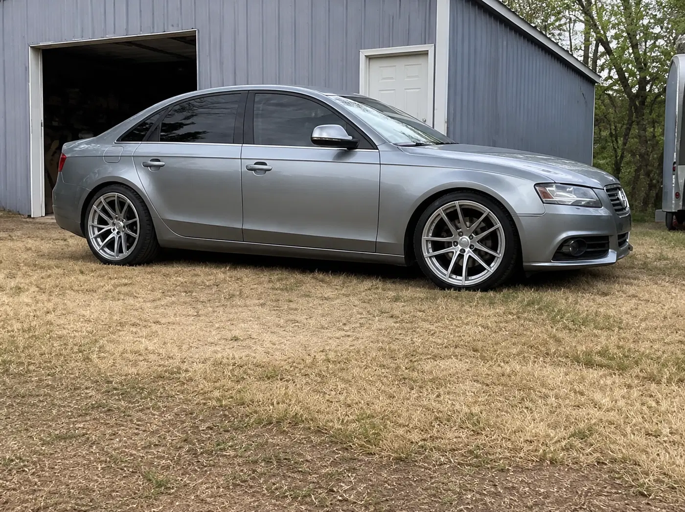 AI-generated view of a 2010 Audi A4 Quattro 2.0T 6MT with Rotiform SPF wheels