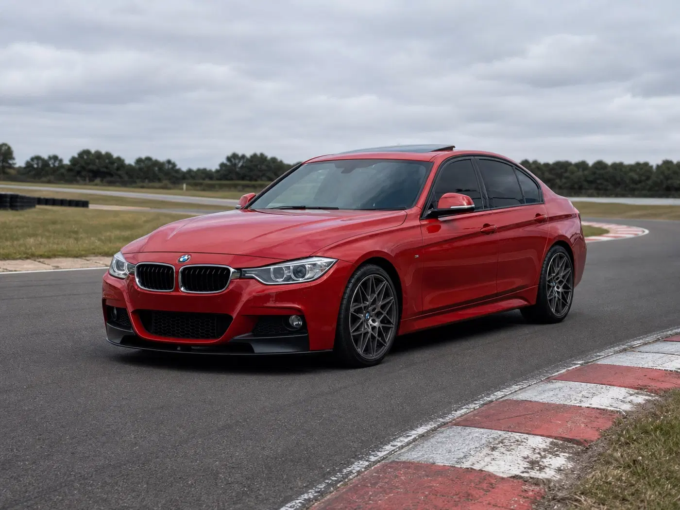 AI-generated view of a 2012 BMW 328i M Sport with AG M-GT wheels