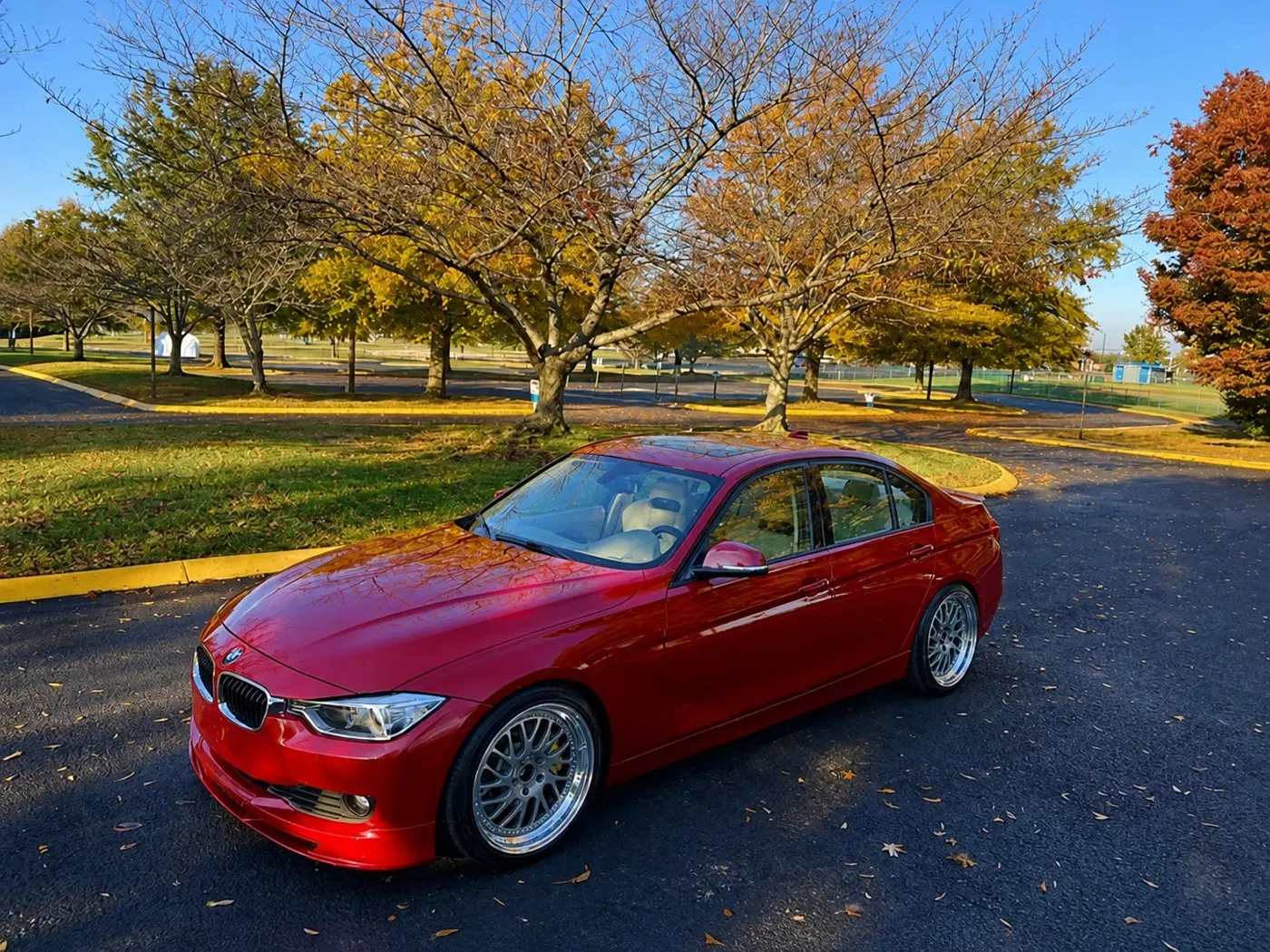 AI-generated view of a 2012 BMW 328i with Heritage Okayama wheels