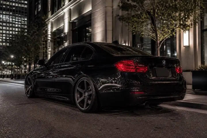 AI-generated view of a 2012 BMW 328i with Stance SC6 wheels