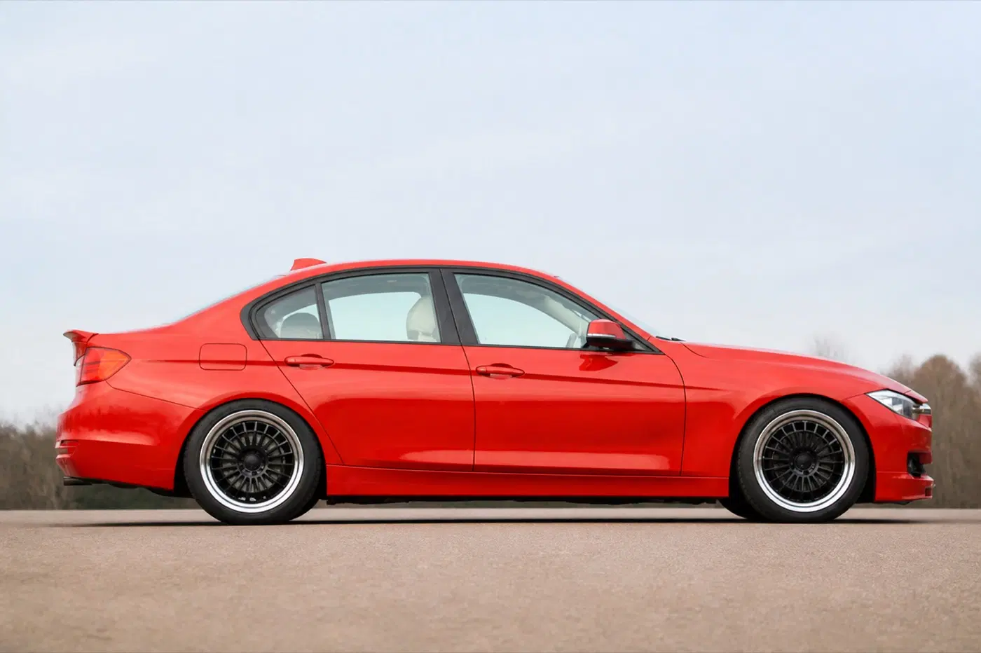 AI-generated view of a 2012 BMW 328i with TSW Rally wheels