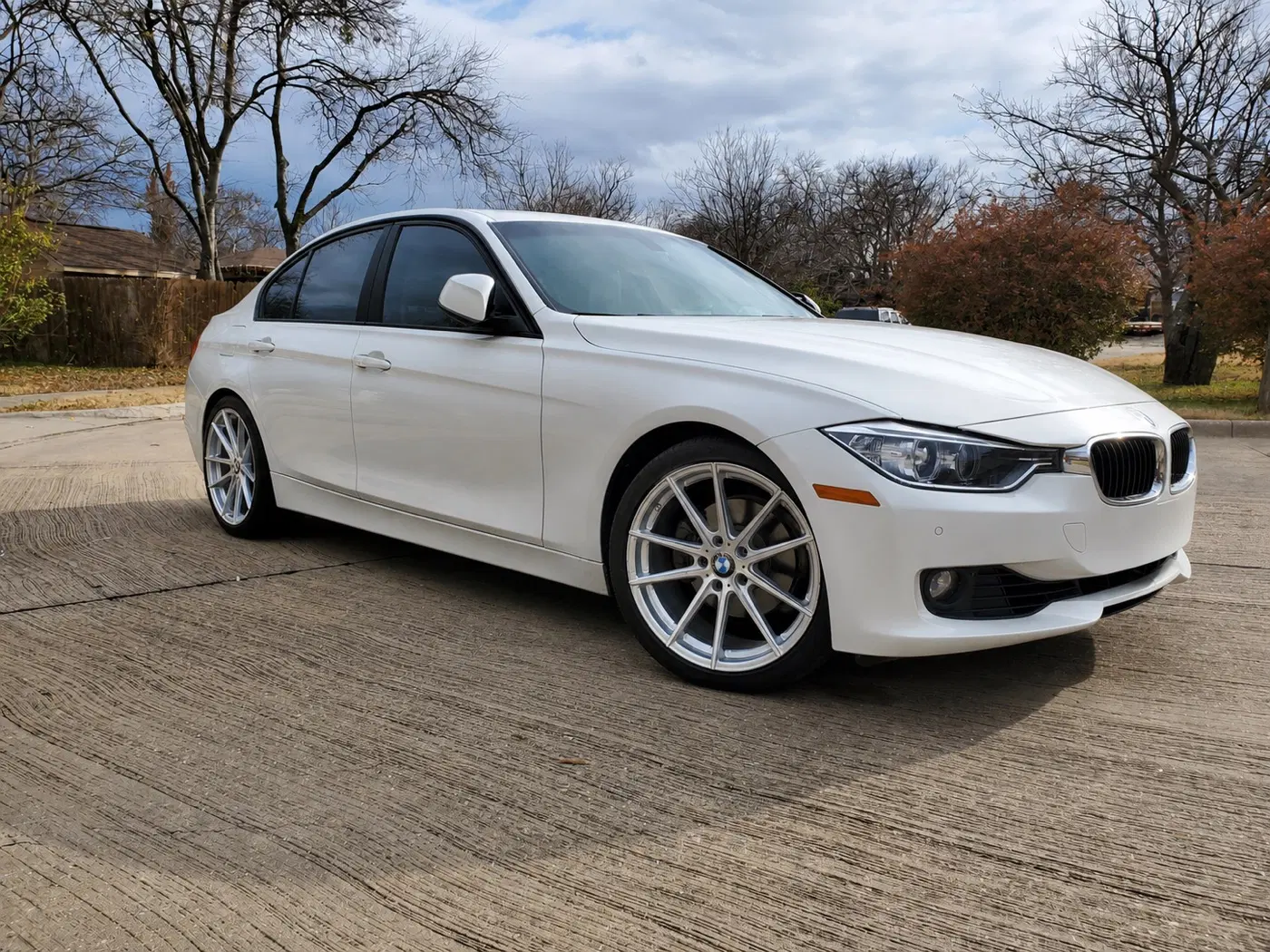 AI-generated view of a 2012 BMW 335i with TSW Bathurst wheels