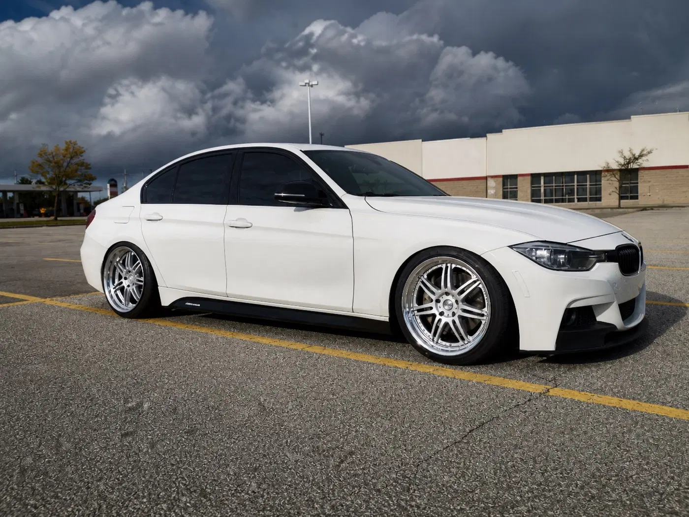 AI-generated view of a 2012 BMW 335i with Work Varianza T1S wheels