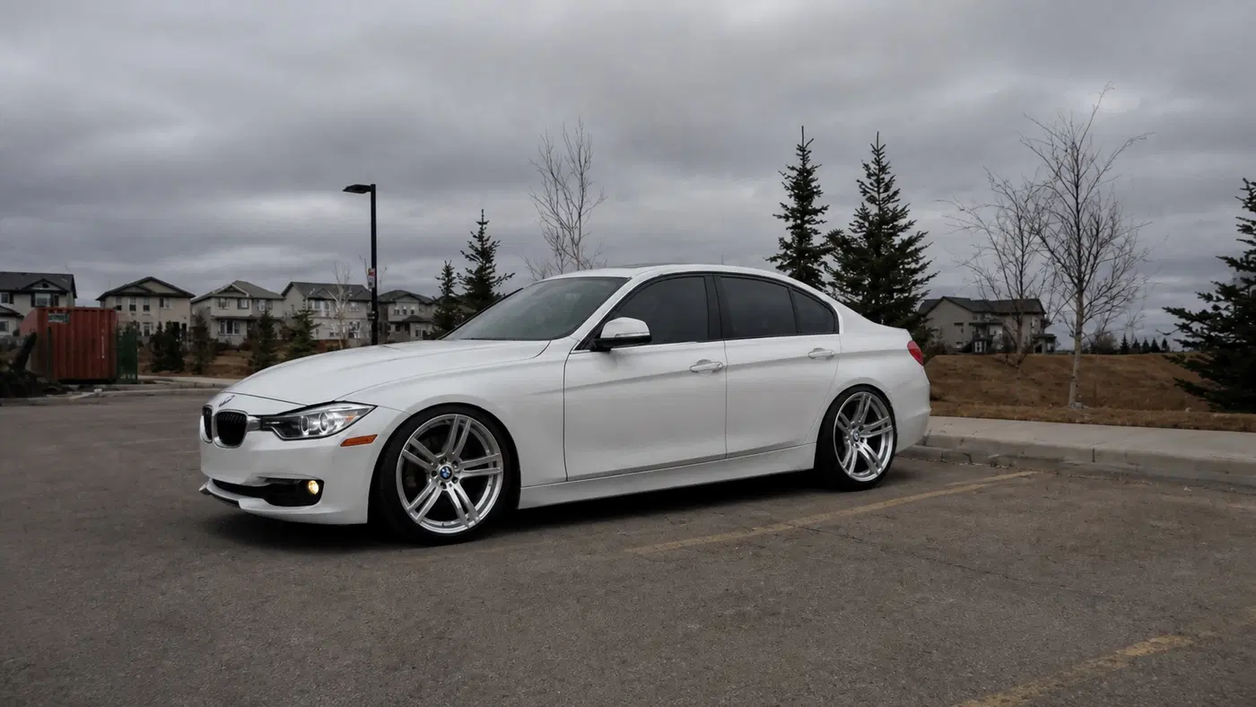 AI-generated view of a 2013 BMW 328i xDrive Luxury Line with AG M5 reps wheels
