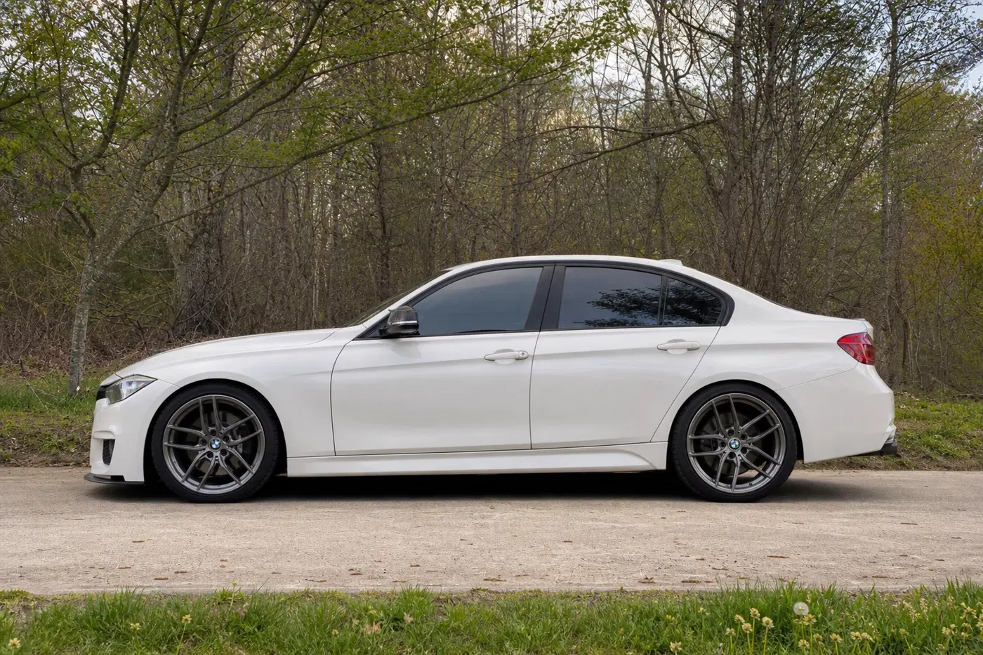 AI-generated view of a 2013 BMW 335i with Stance SF03 wheels