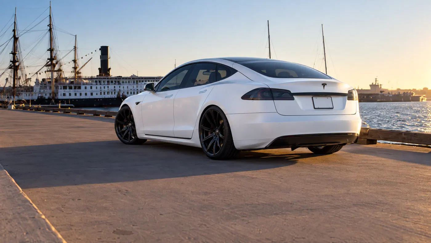 AI-generated view of a 2013 Tesla Model S P85 with Vossen CV4 wheels