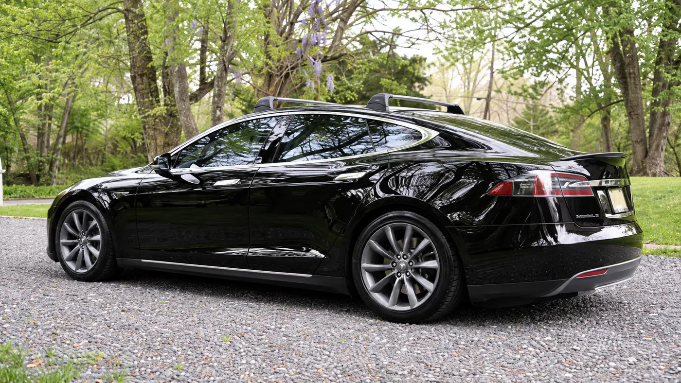 AI-generated view of a 2013 Tesla Model S P85 with T Sportline TST wheels