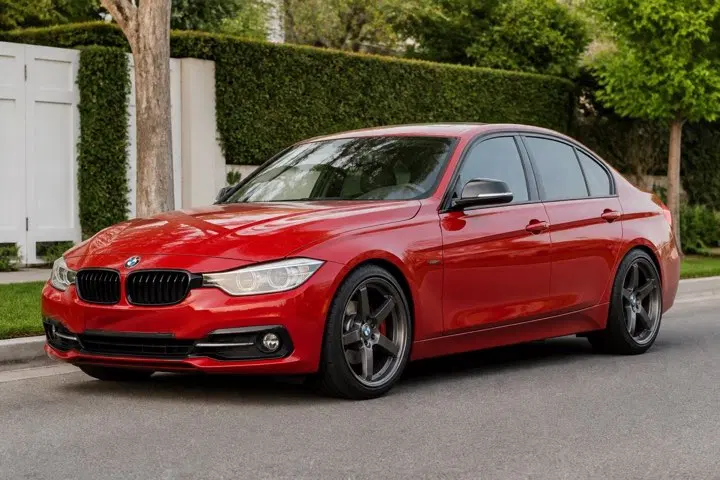 AI-generated view of a 2014 BMW 328d Sport Line with VMR V721 wheels