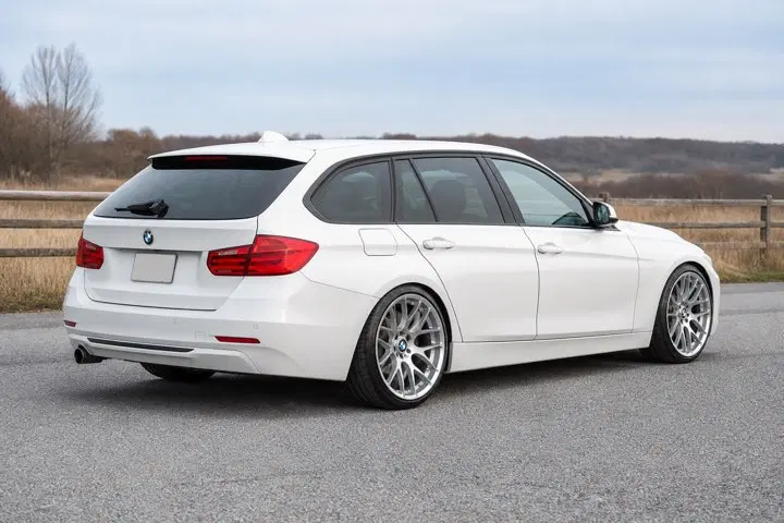 AI-generated view of a 2014 BMW 328i xDrive Touring with MORR VS8.2 wheels