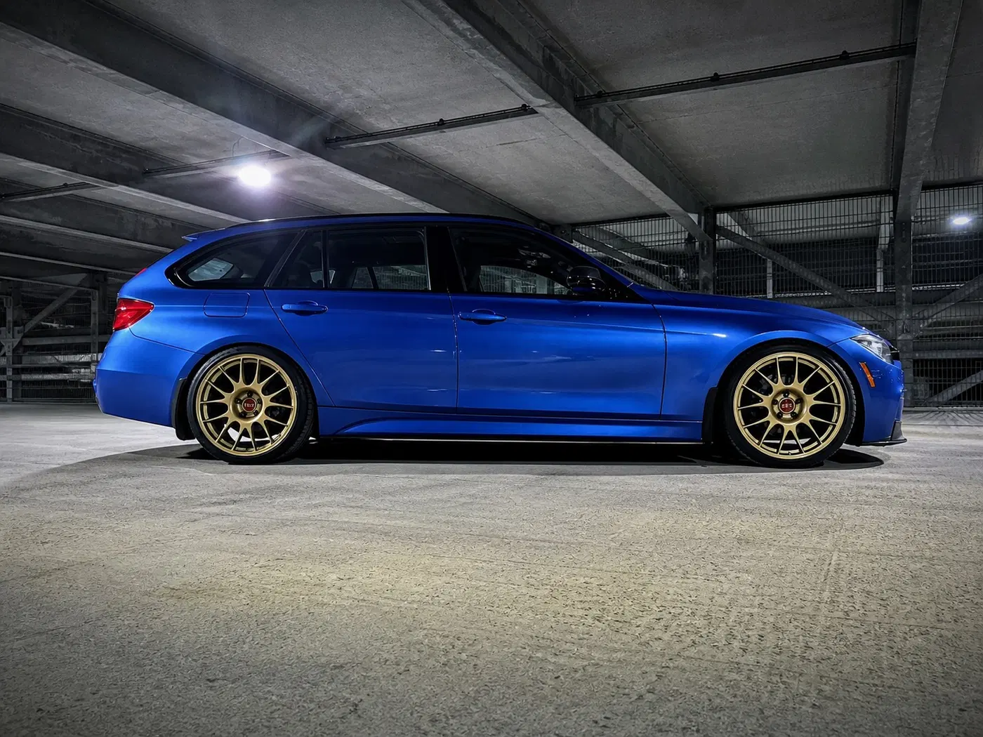 AI-generated view of a 2014 BMW 328xi Touring with BBS RE wheels