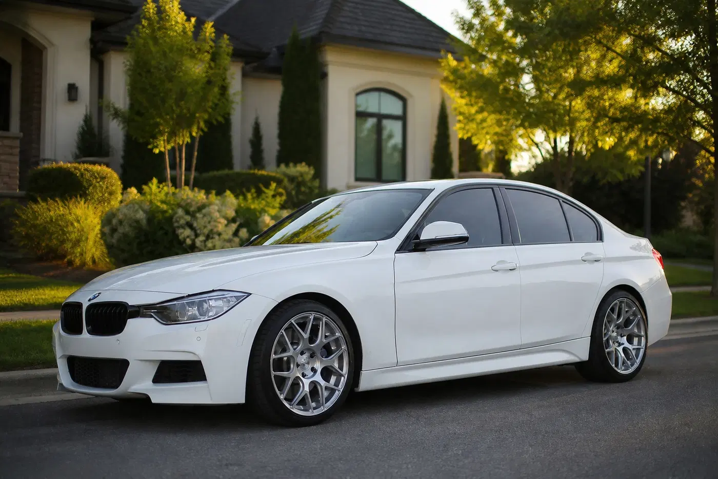 AI-generated view of a 2014 BMW 335i M Sport with AG M590 wheels
