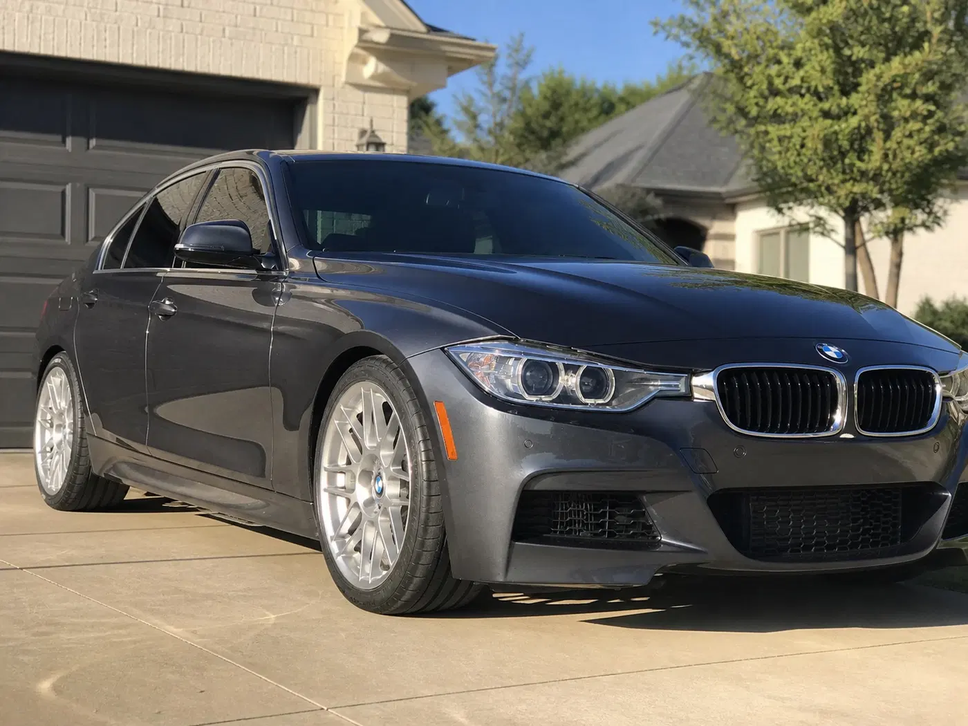 AI-generated view of a 2014 BMW 335i M Sport with APEX ARC-8 wheels