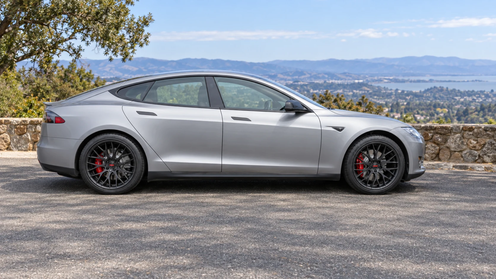 AI-generated view of a 2014 Tesla Model S P85 with TSW Amaroo wheels