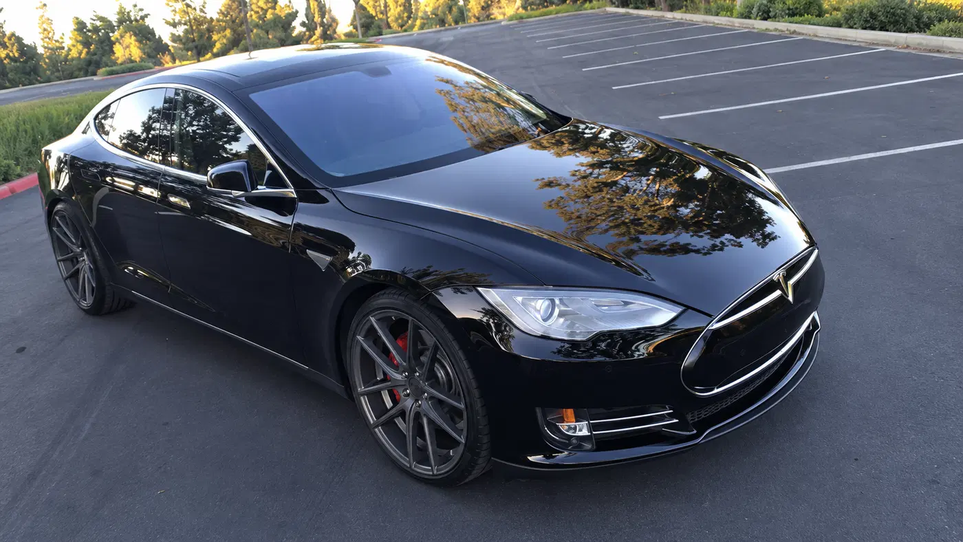 AI-generated view of a 2014 Tesla Model S P85 with Niche Targa M129 wheels