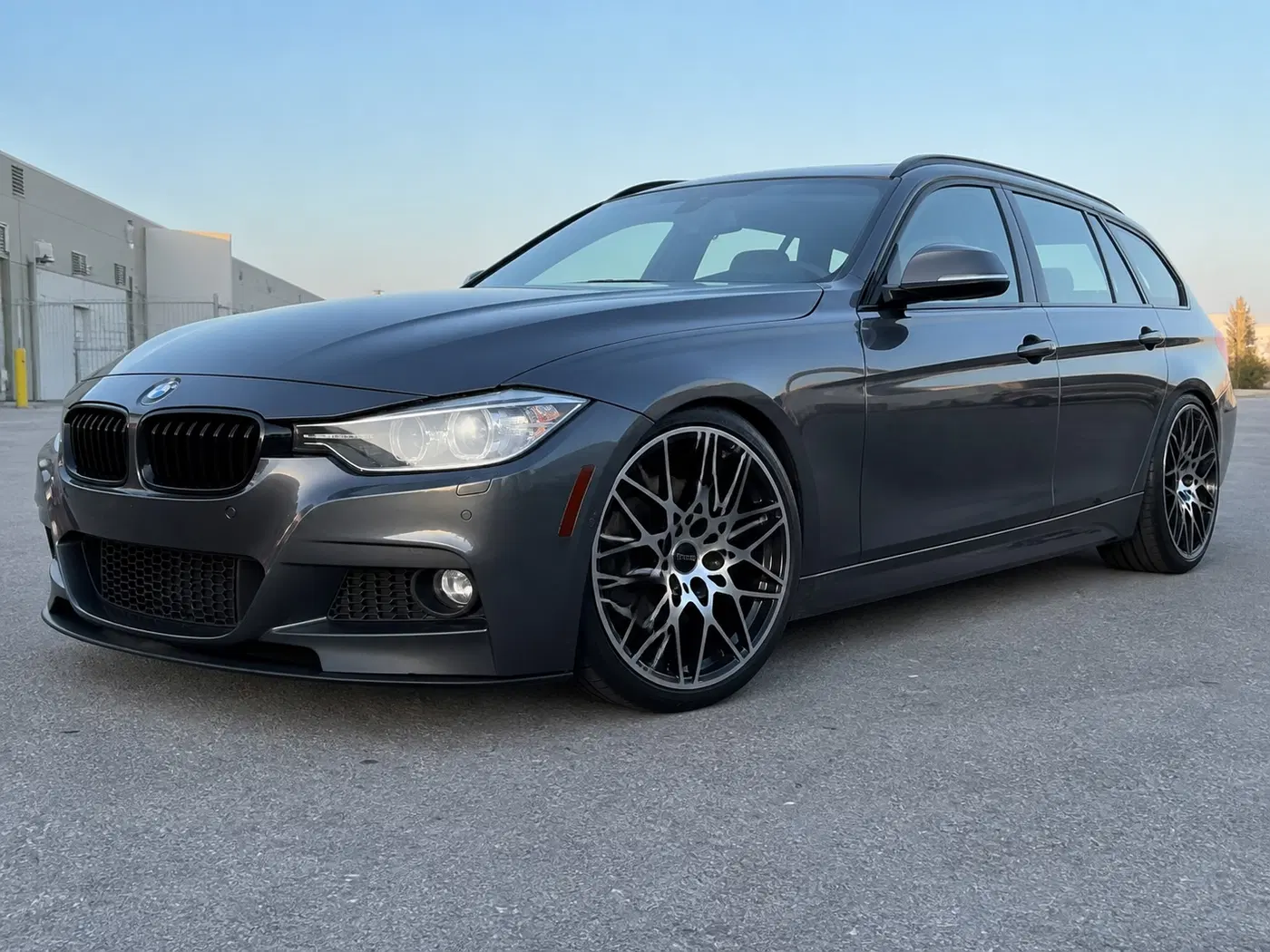 AI-generated view of a 2015 BMW 328d xDrive M Sport Touring with Alzor 758 wheels