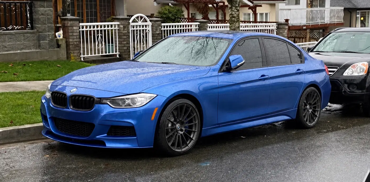 AI-generated view of a 2015 BMW 335i with HRE FF15 wheels