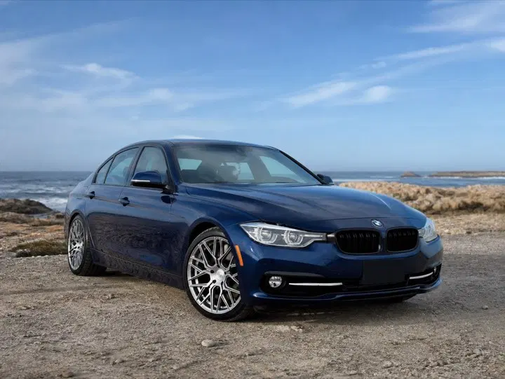 AI-generated view of a 2016 BMW 328i xDrive with Rohana RFX10 wheels