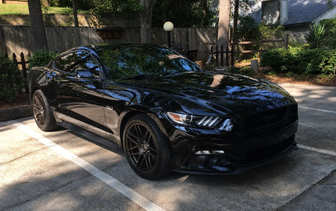 AI-generated view of a 2016 Ford Mustang GT with Forgestar F14 wheels