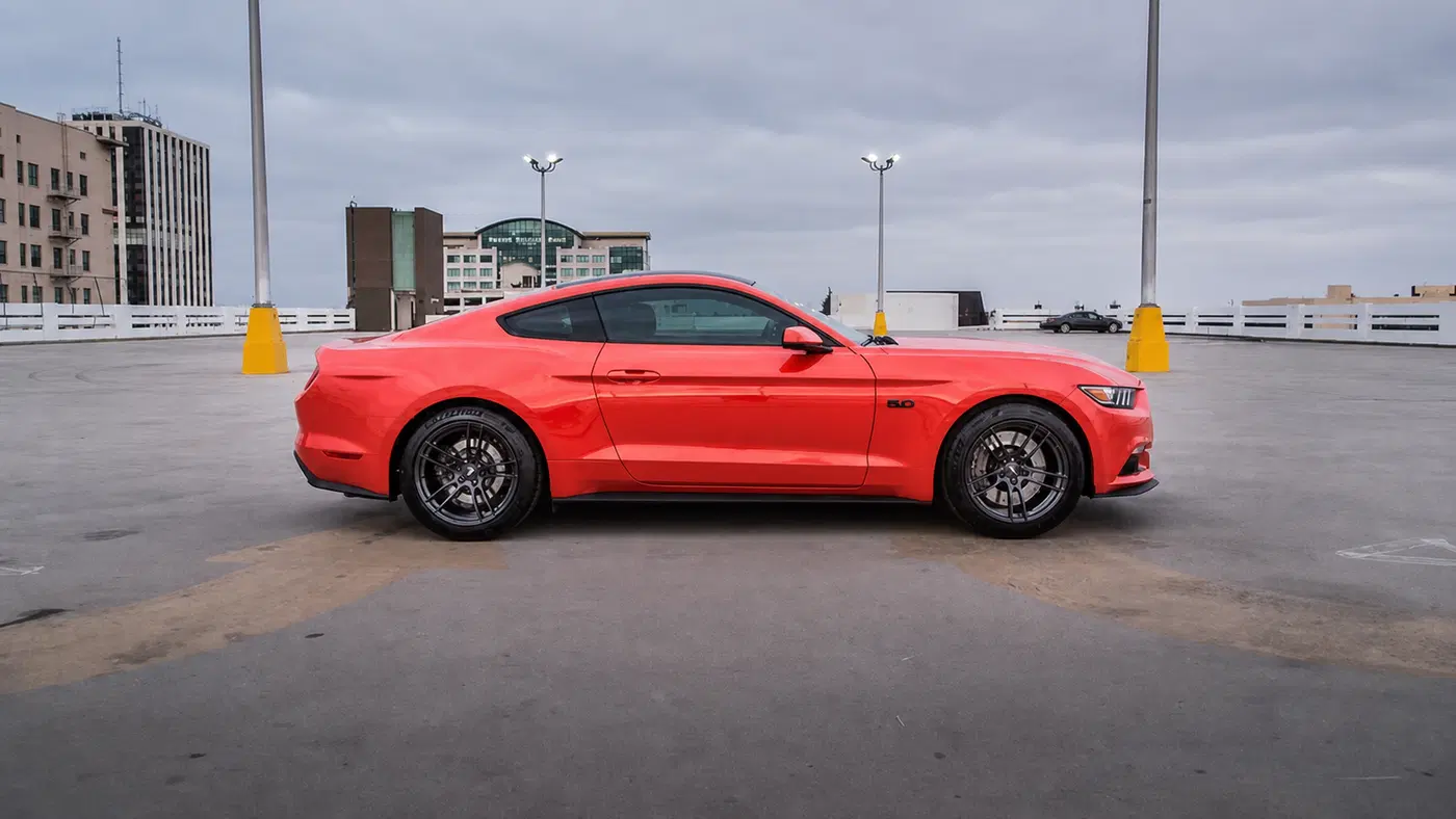 AI-generated view of a 2016 Ford Mustang GT with P51 101RF wheels