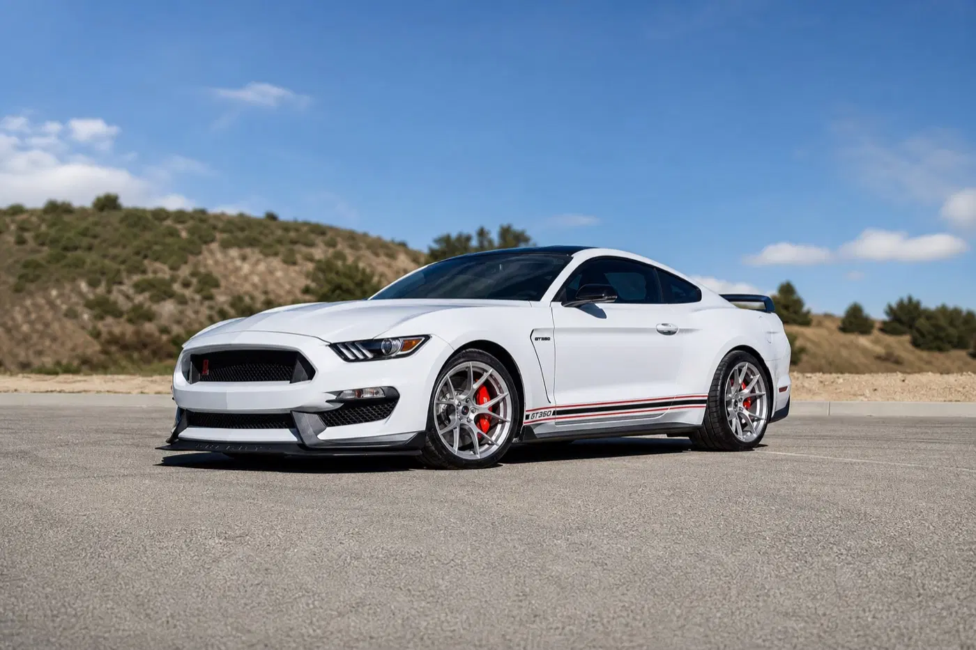AI-generated view of a 2016 Ford Shelby GT350 with Project 6GR Ten wheels