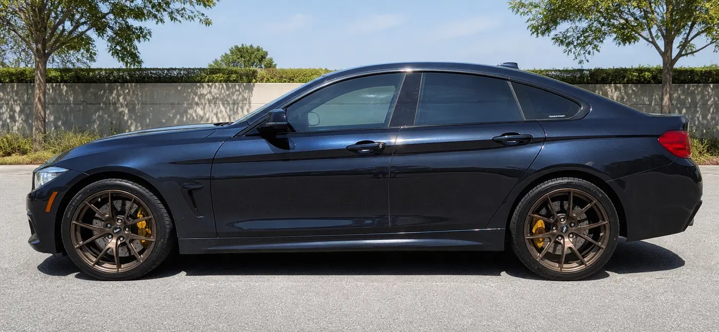 AI-generated view of a 2017 BMW 440i xDrive Gran Coupe with APEX VS-5 wheels