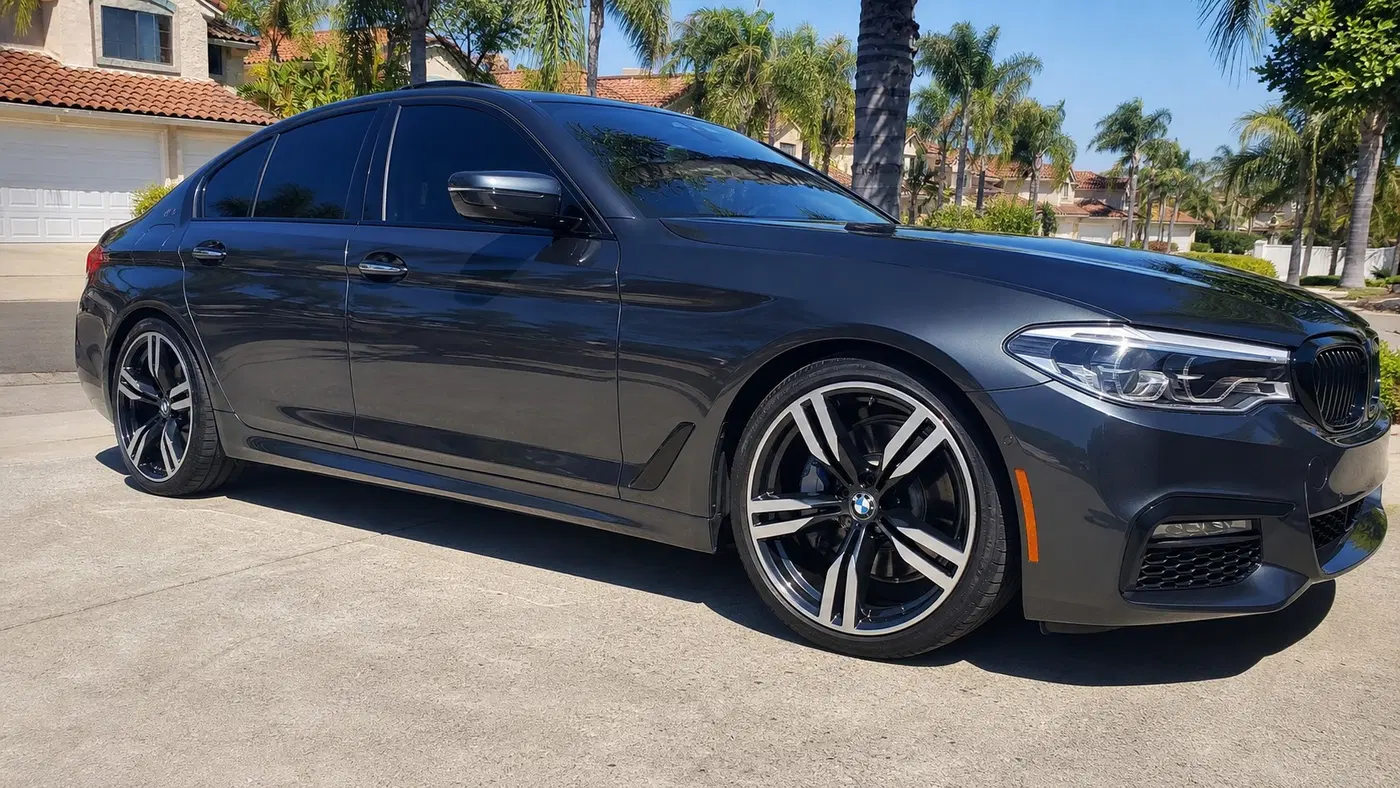 AI-generated view of a 2017 BMW 540i M Sport with BMW 648M wheels