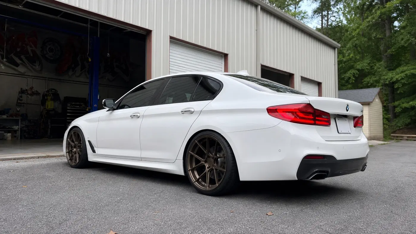 AI-generated view of a 2017 BMW 540i M Sport with Ferrada N/A wheels