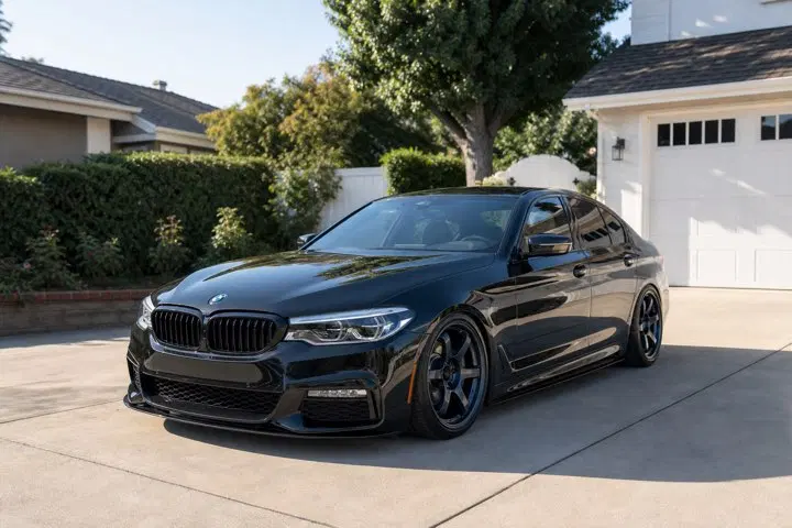 AI-generated view of a 2017 BMW 540i with Rays Gram Lights 57DR wheels