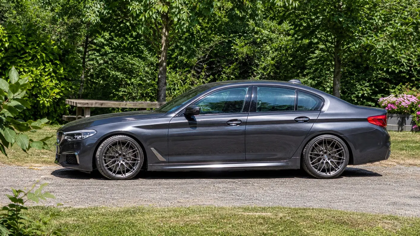 AI-generated view of a 2017 BMW M550i with VS Forged VS10 wheels