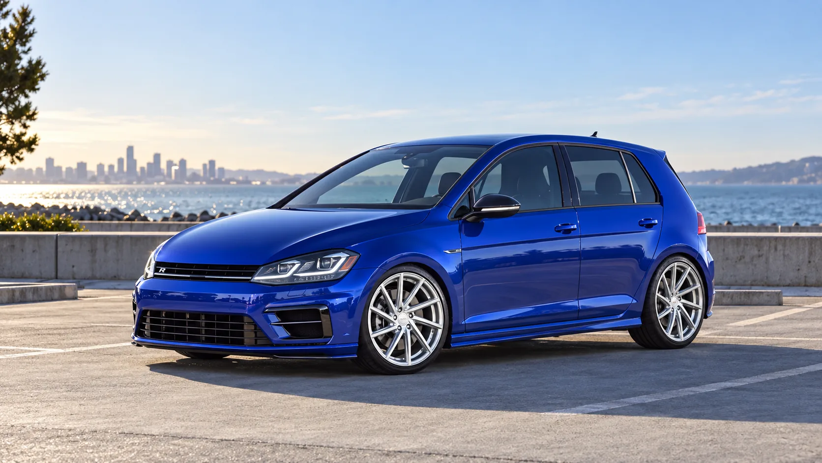 AI-generated view of a 2017 Volkswagen Golf R with Vossen CVT wheels