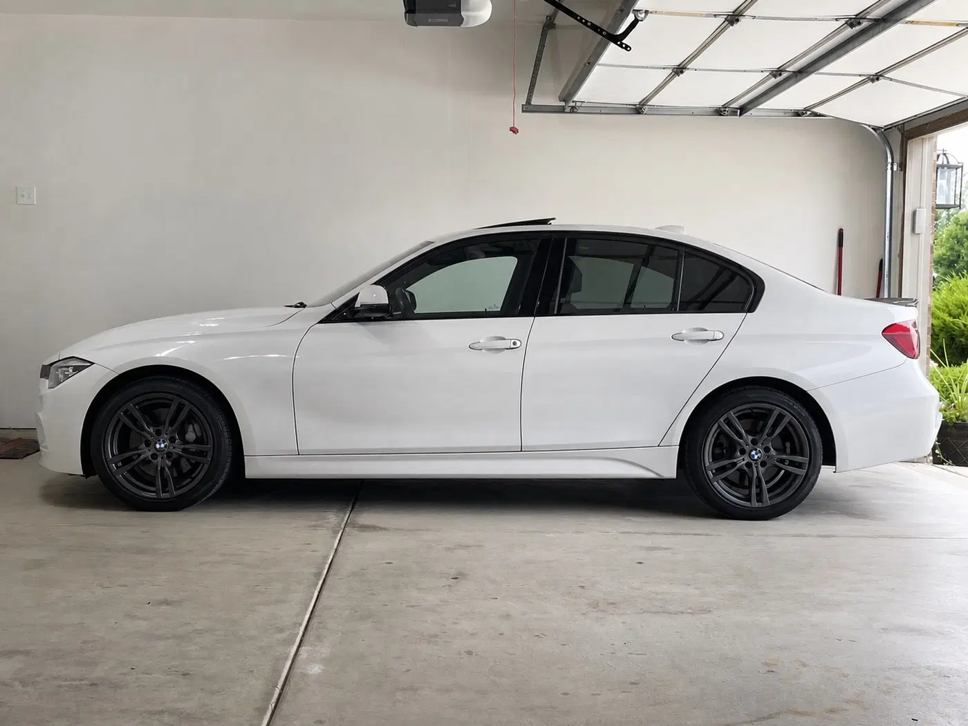 AI-generated view of a 2018 BMW 330i xDrive M Sport with RTX Graz wheels