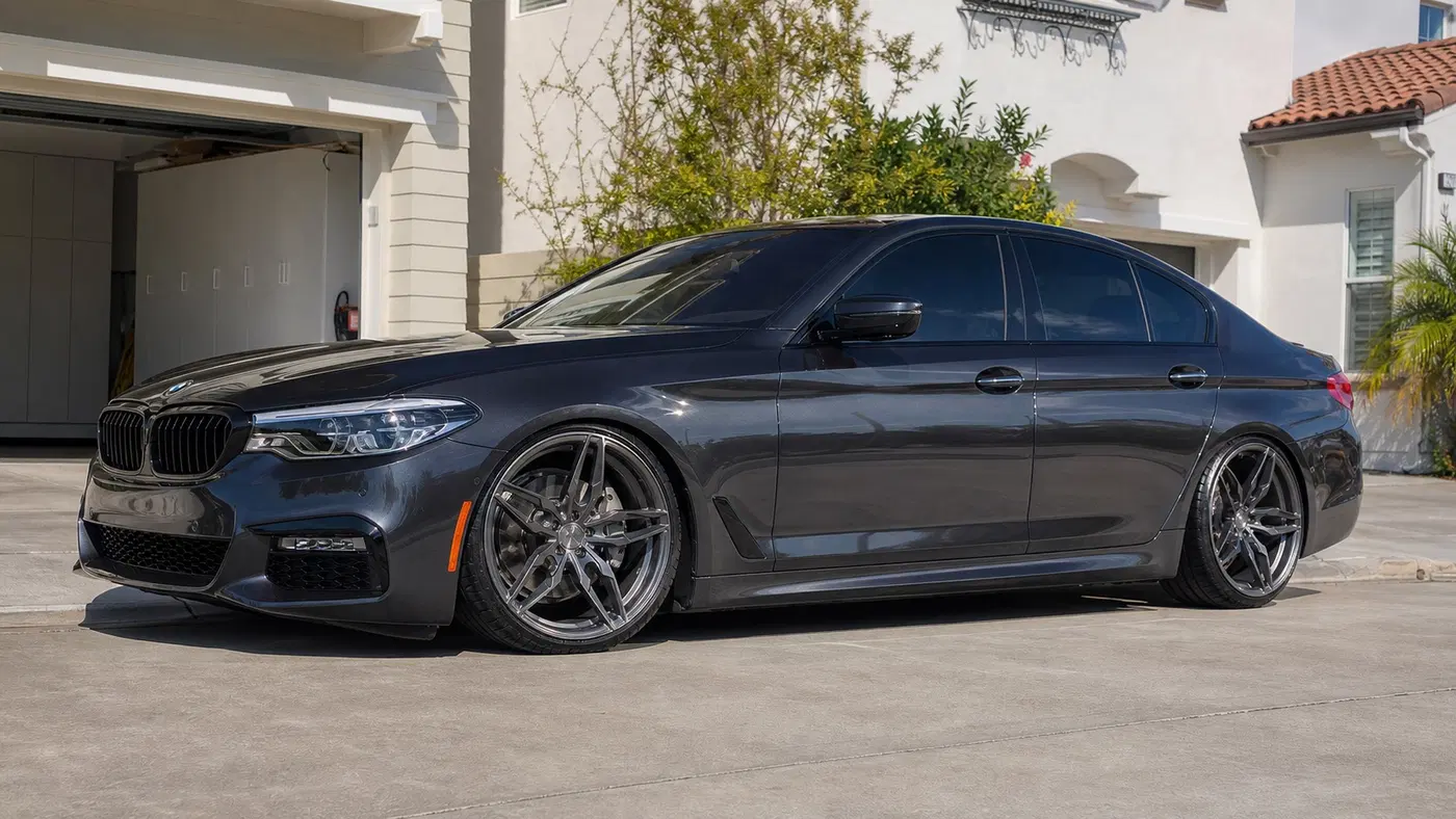 AI-generated view of a 2018 BMW 540i with VS Forged VS03 wheels