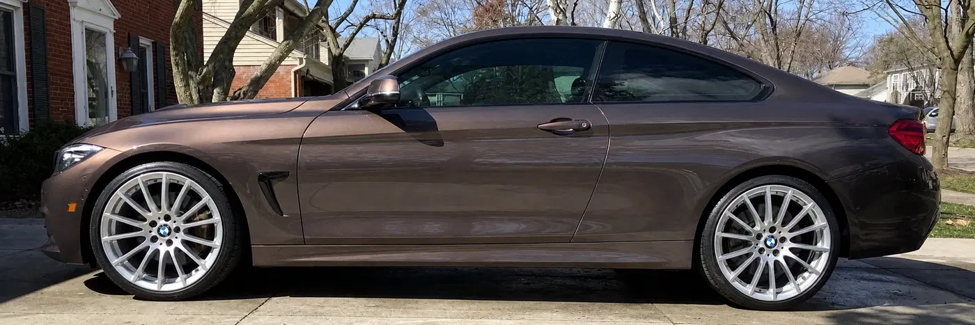 AI-generated view of a 2019 BMW 440i M-Sport with BMW 405M wheels