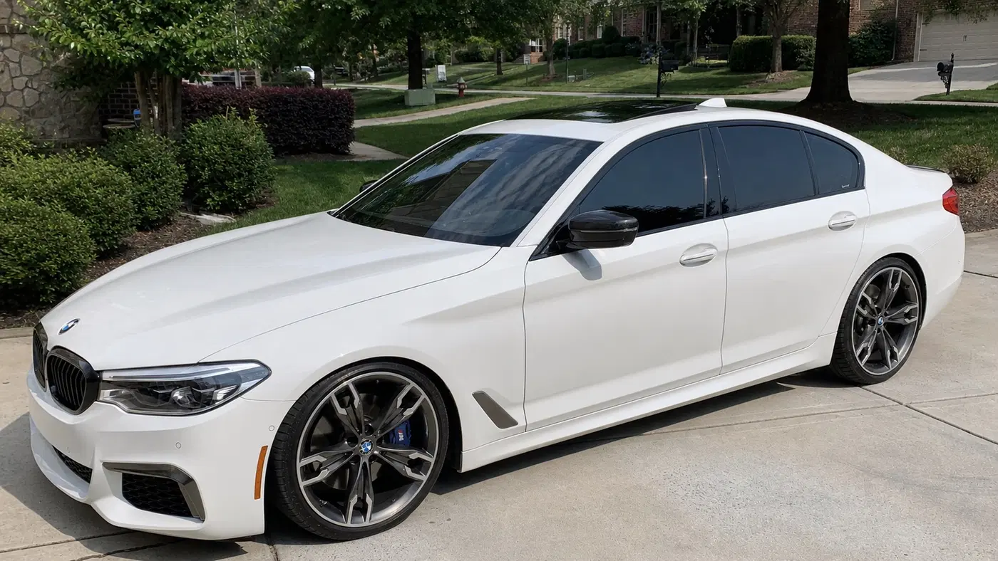 AI-generated view of a 2019 BMW M550i with BMW N/A wheels