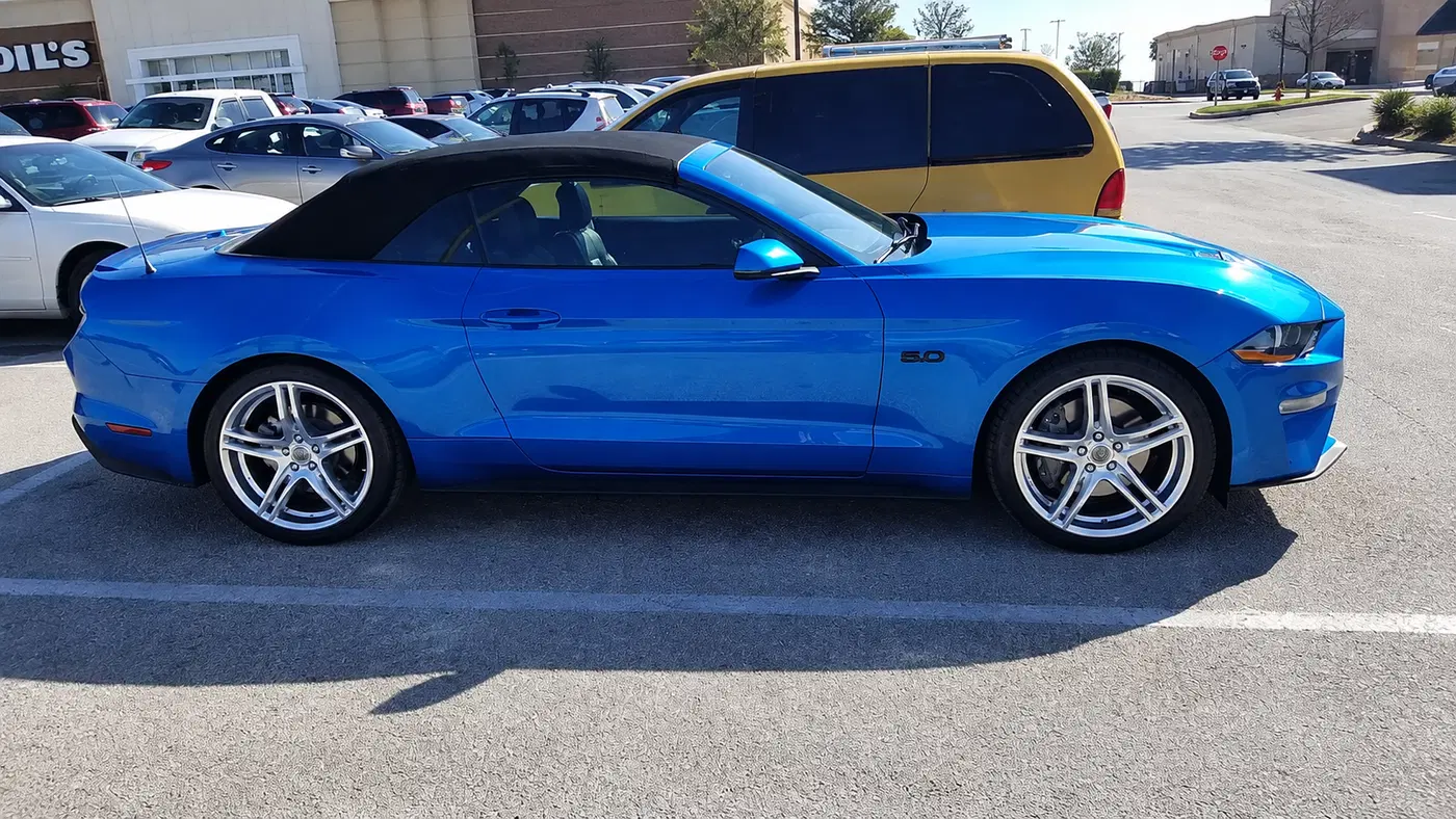 AI-generated view of a 2019 Ford Mustang GT Convertible with Shelby CS14 wheels