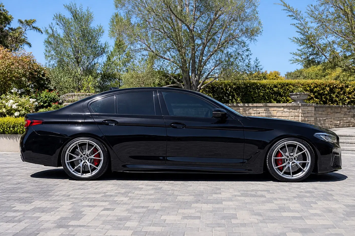 AI-generated view of a 2021 BMW 540 with BBS CI-R wheels