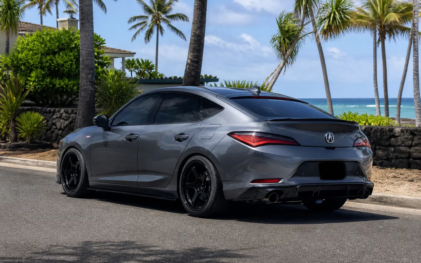 AI-generated view of a 2023 Acura Integra with yokohama gt beyonds wheels