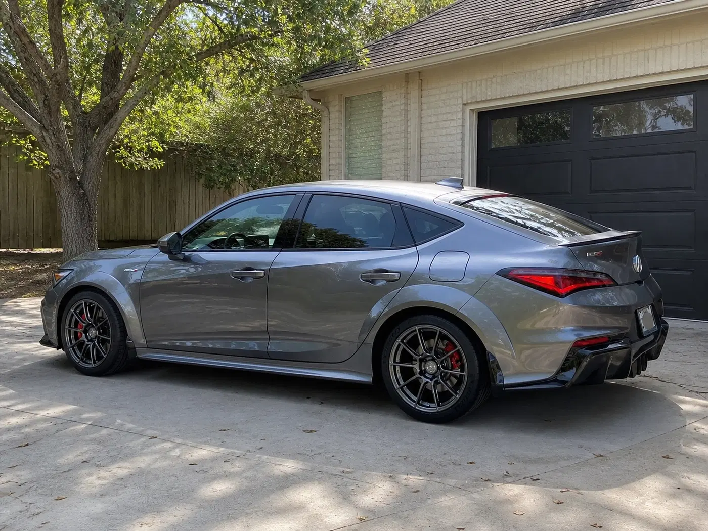 AI-generated view of a 2024 Acura Integra Type S with Apex SM-10rs wheels
