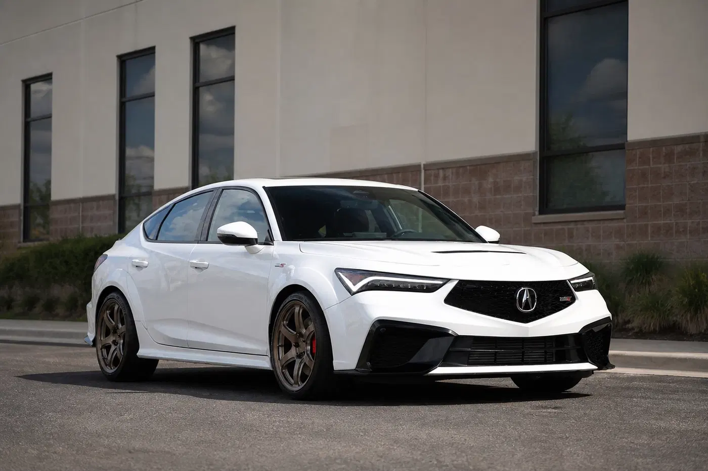 AI-generated view of a 2024 Acura Integra Type S with Titan-7 T-D6 wheels