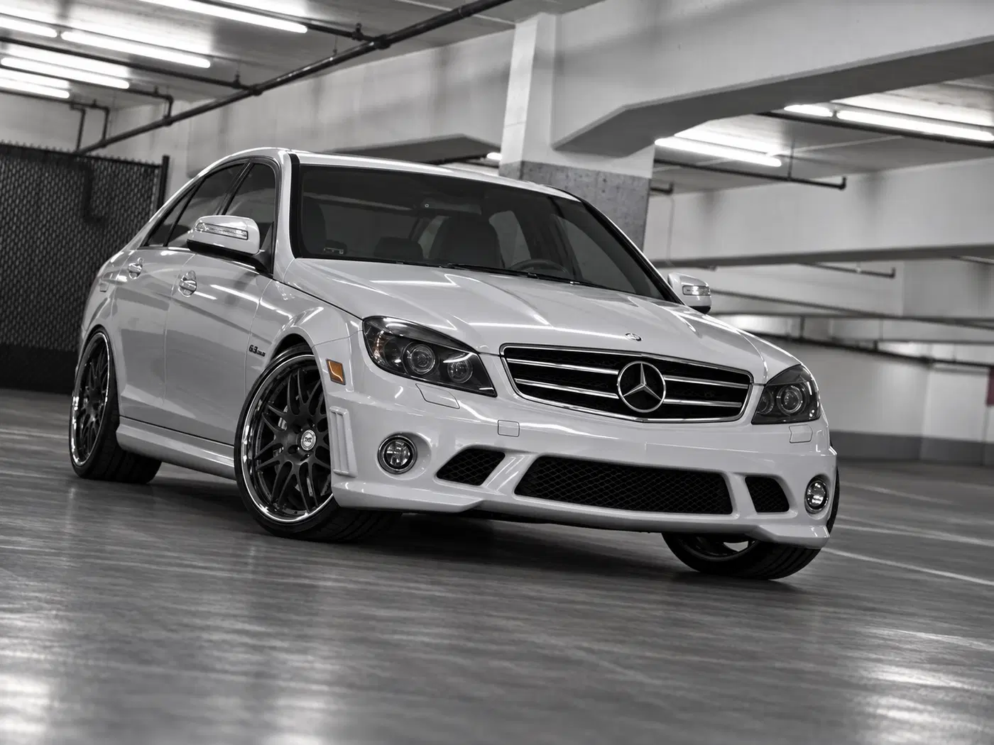 AI-generated view of a 2009 Mercedes-Benz C63 AMG with HRE 840R wheels