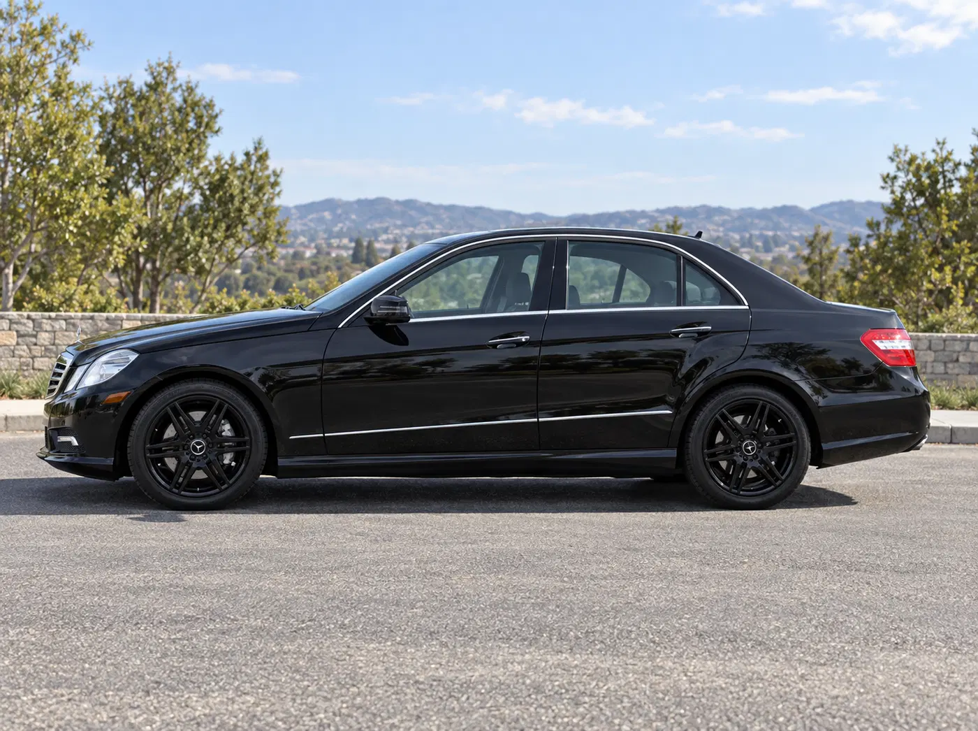 AI-generated view of 2010 Mercedes-Benz E550 Sport Sedan on Mercedes-Benz AMG OEM 18-inch