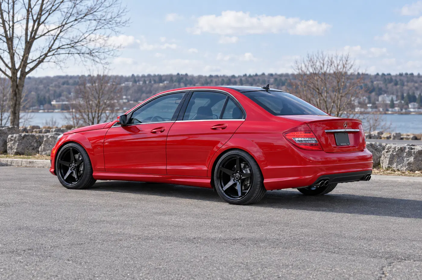 AI-generated view of a 2009 Mercedes-Benz C350 4MATIC with Stance SC-5ive wheels