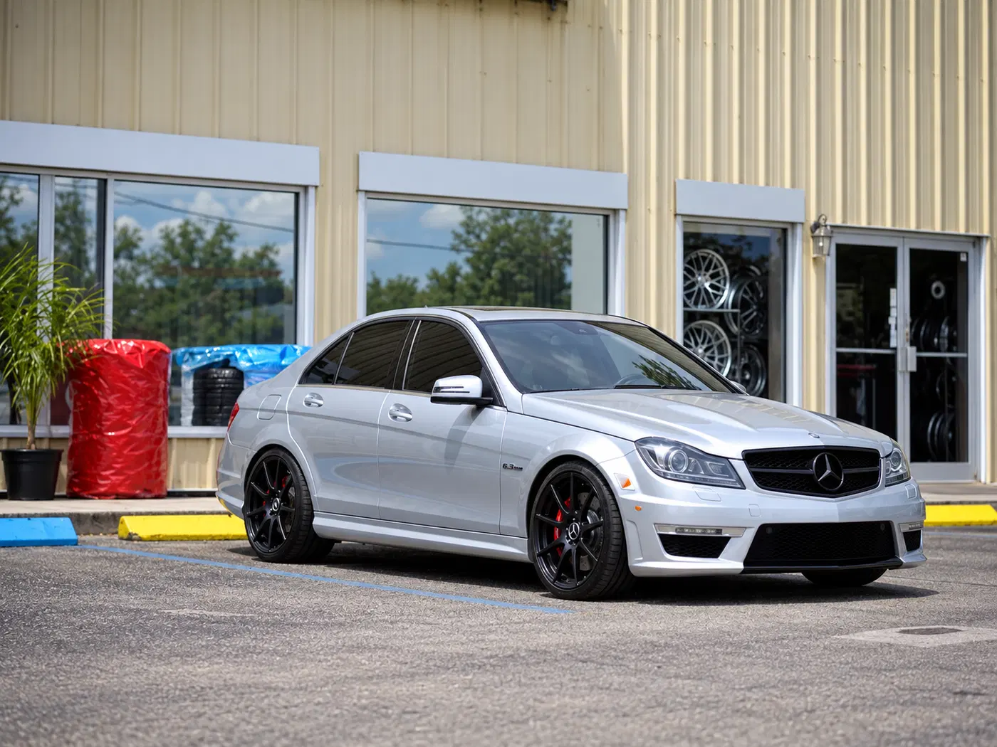 AI-generated view of a 2012 Mercedes-Benz C63 AMG with TSW Interlagos wheels