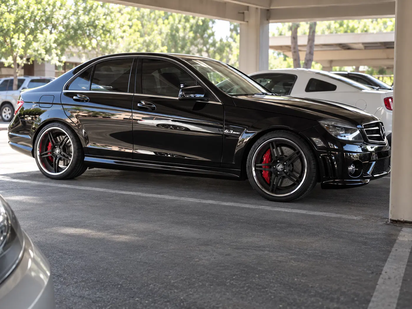 AI-generated view of a 2011 Mercedes-Benz C63 AMG with DPE SP-5 wheels