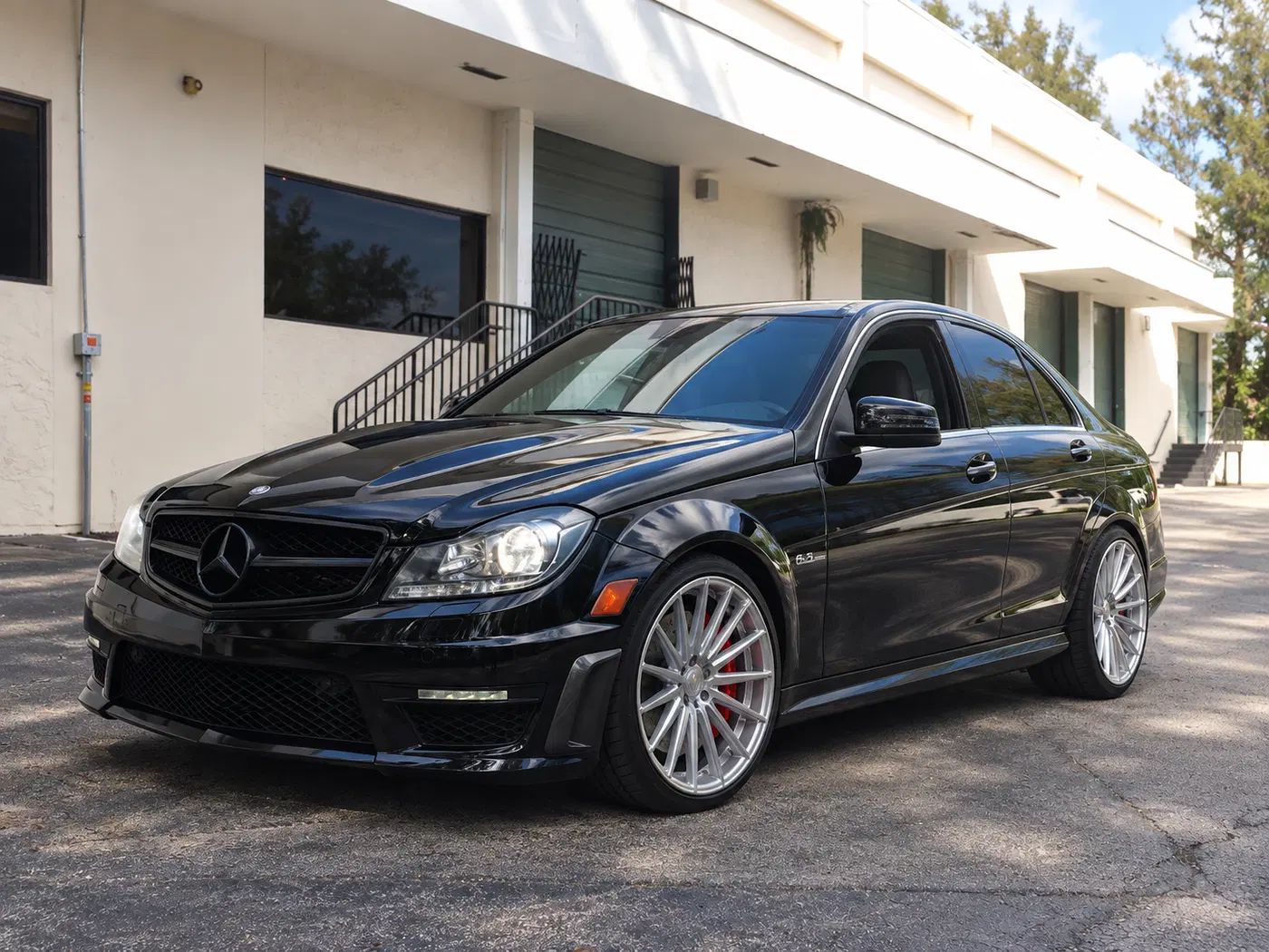 AI-generated view of a 2012 Mercedes-Benz C63 AMG with Vossen VFS2 wheels
