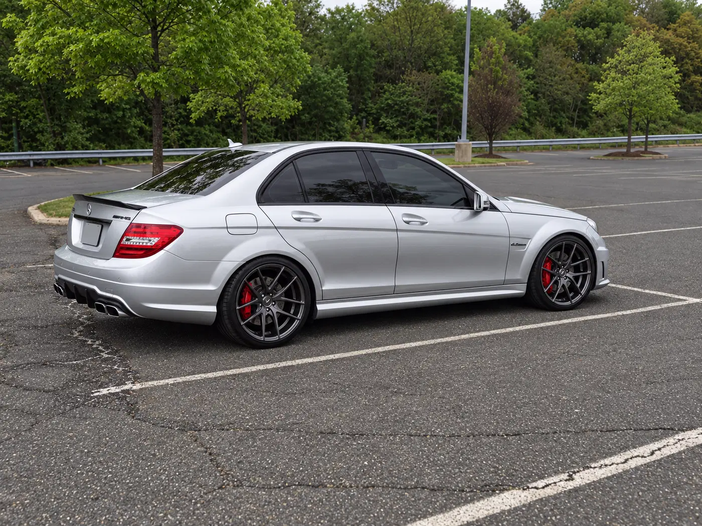 AI-generated view of a 2012 Mercedes-Benz C63 AMG with Niche Targa wheels