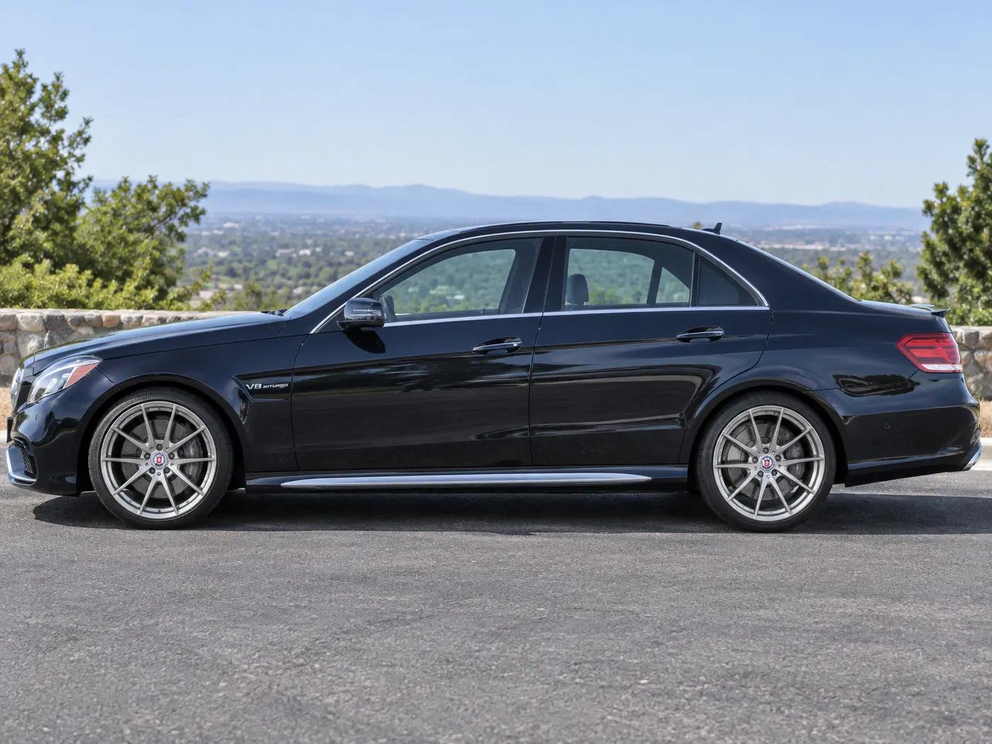 AI-generated view of a 2014 Mercedes-Benz E63 AMG S 4MATIC with HRE FF01 wheels