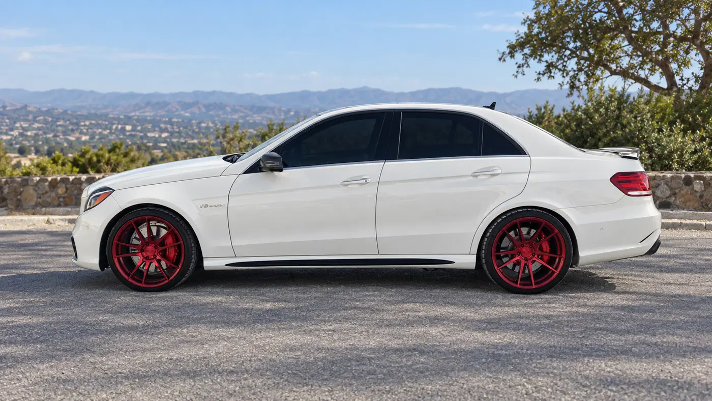 AI-generated view of a 2014 Mercedes-Benz E63 S AMG with Rohana RF2 wheels