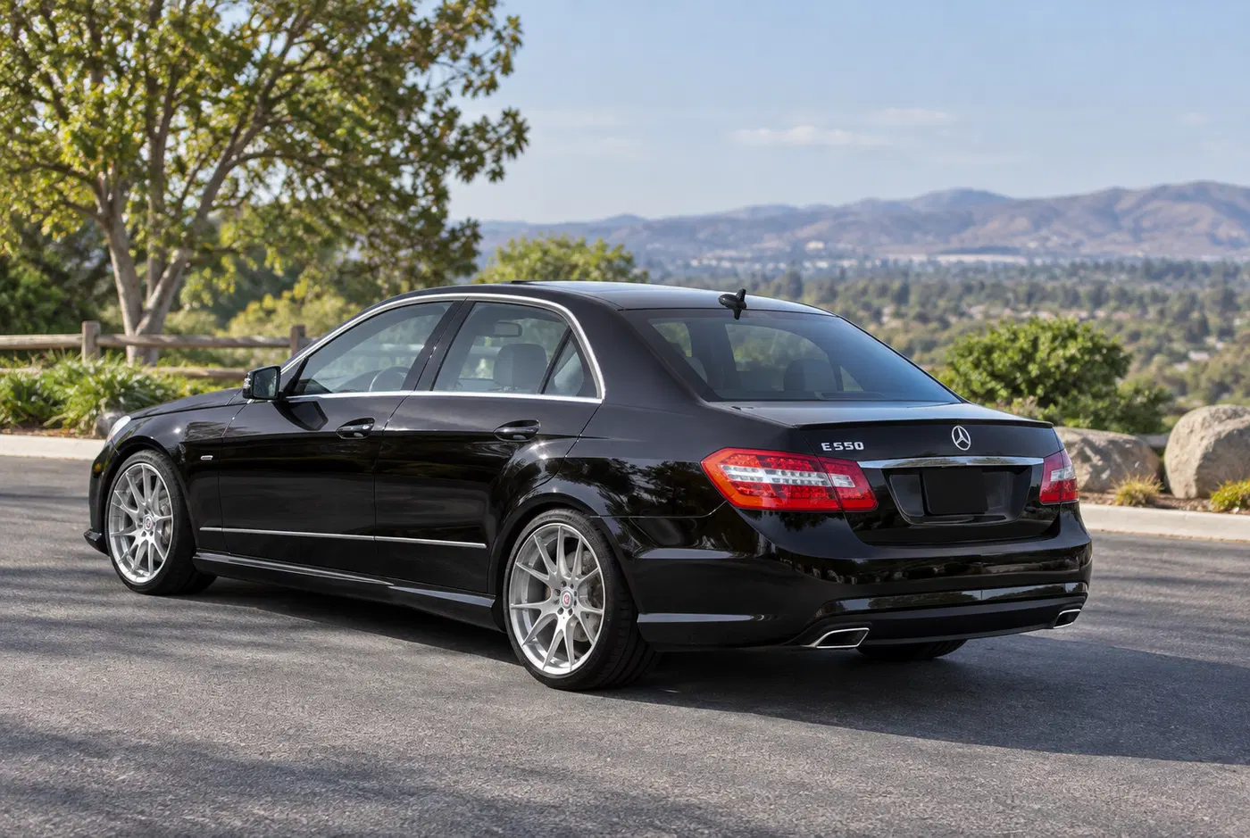 AI-generated view of a 2011 Mercedes-Benz E550 with HRE 790R wheels