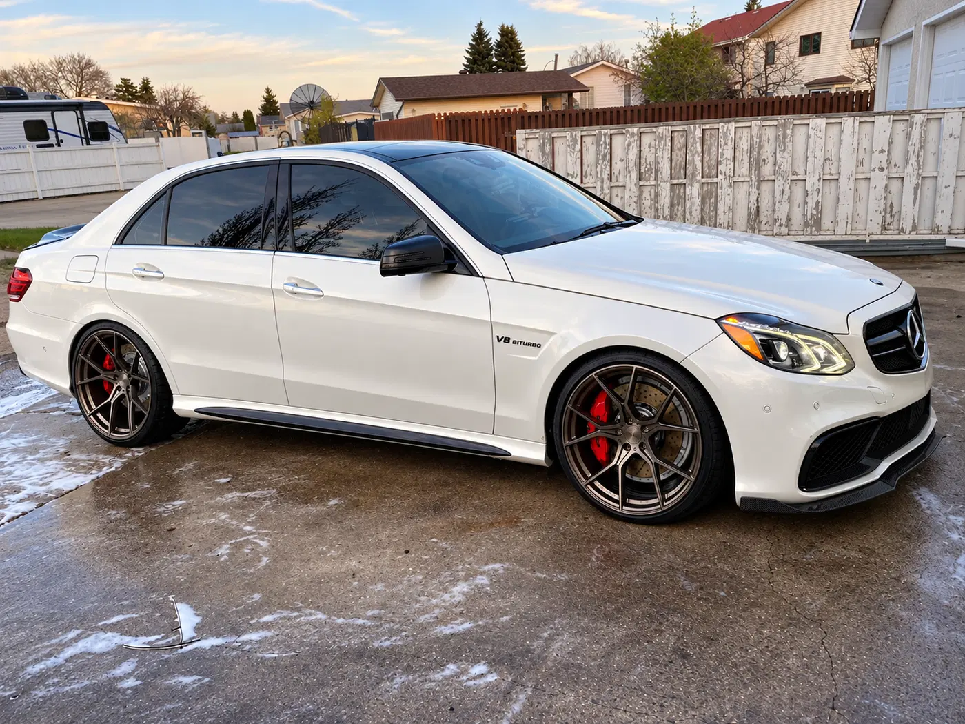 AI-generated view of a 2014 Mercedes-Benz E63 S AMG with Stance N/A wheels